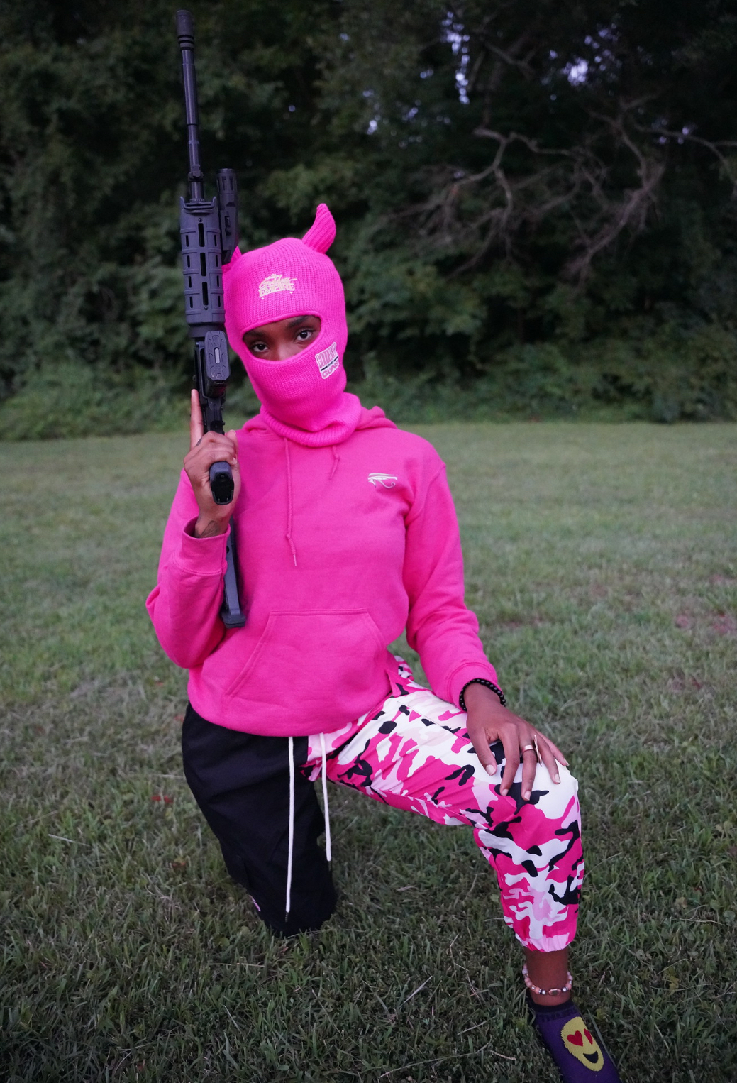 Beauty, Business & Bullets — pink-led gun range social